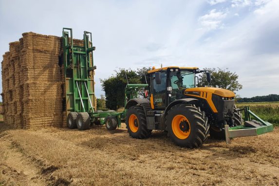 JCB Stacking 2nd load of bales with Trailer